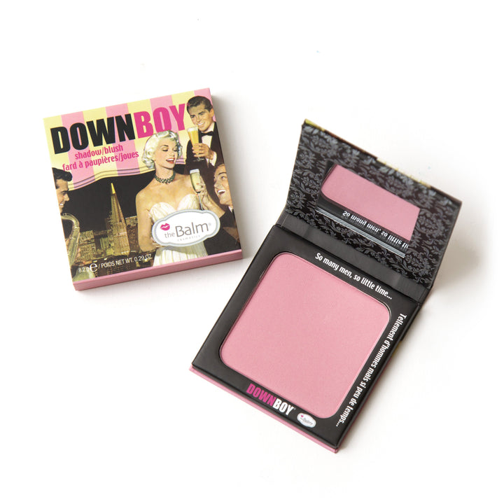 Photograph showing DownBoy packaging and makeup. Makeup half closed