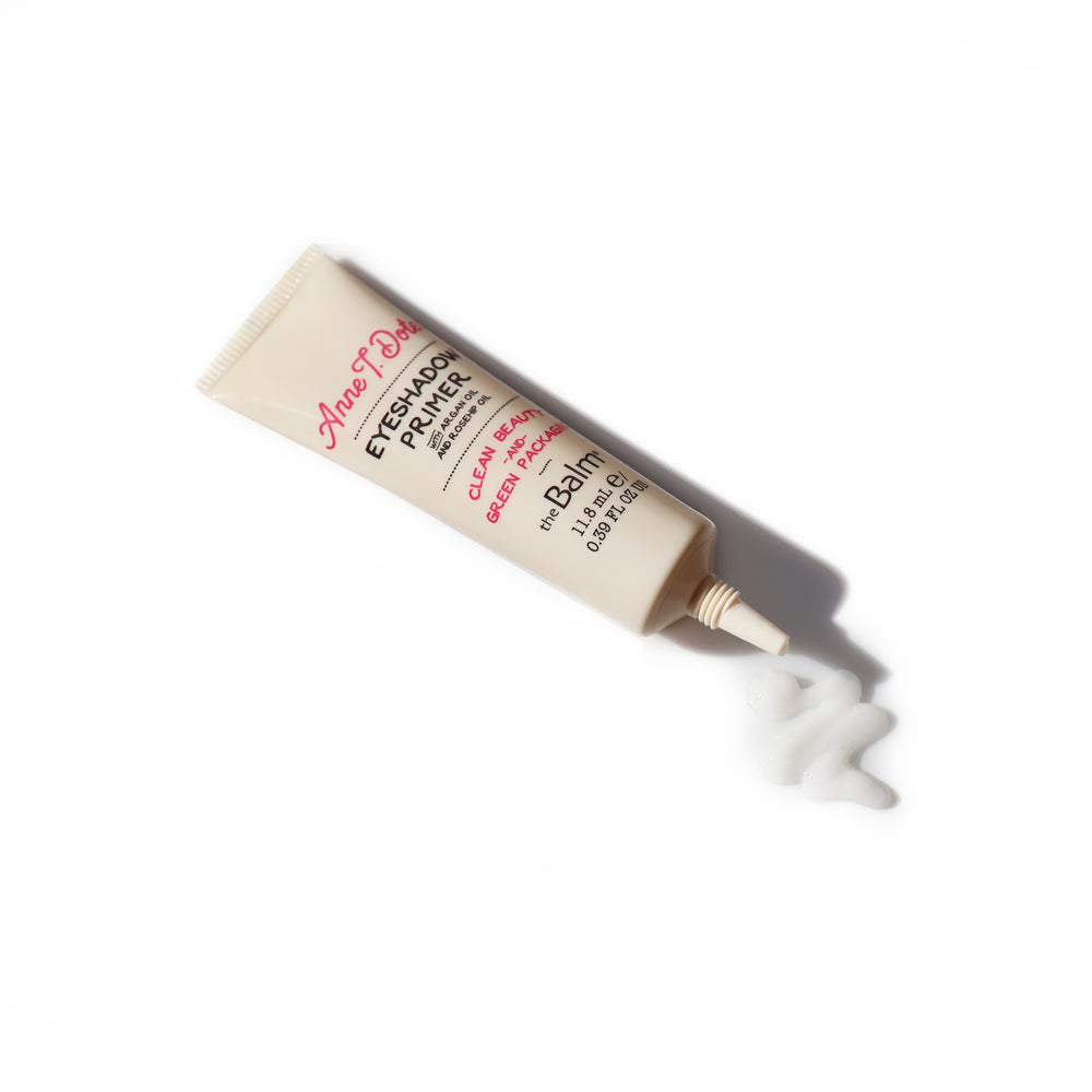 Photograph of Anne T. Dote makeup tube with some applied on a white background