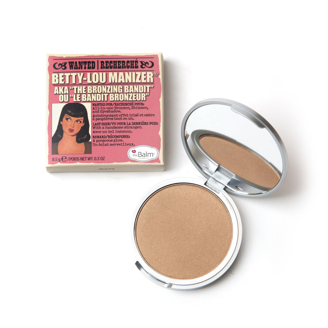 Photograph showing Betty-Lou Manizer Bronzer packaging and makeup. Makeup half closed