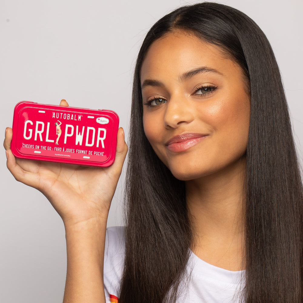 Photograph showing Autobalm Grl Pwdr packaging with a model