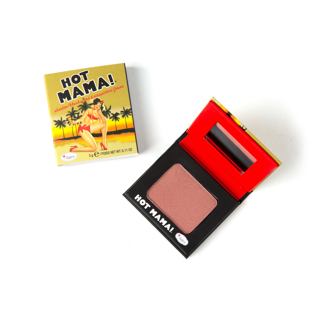 Photograph showing Hot Mama Travel-size Packaging and makeup. Makeup half closed