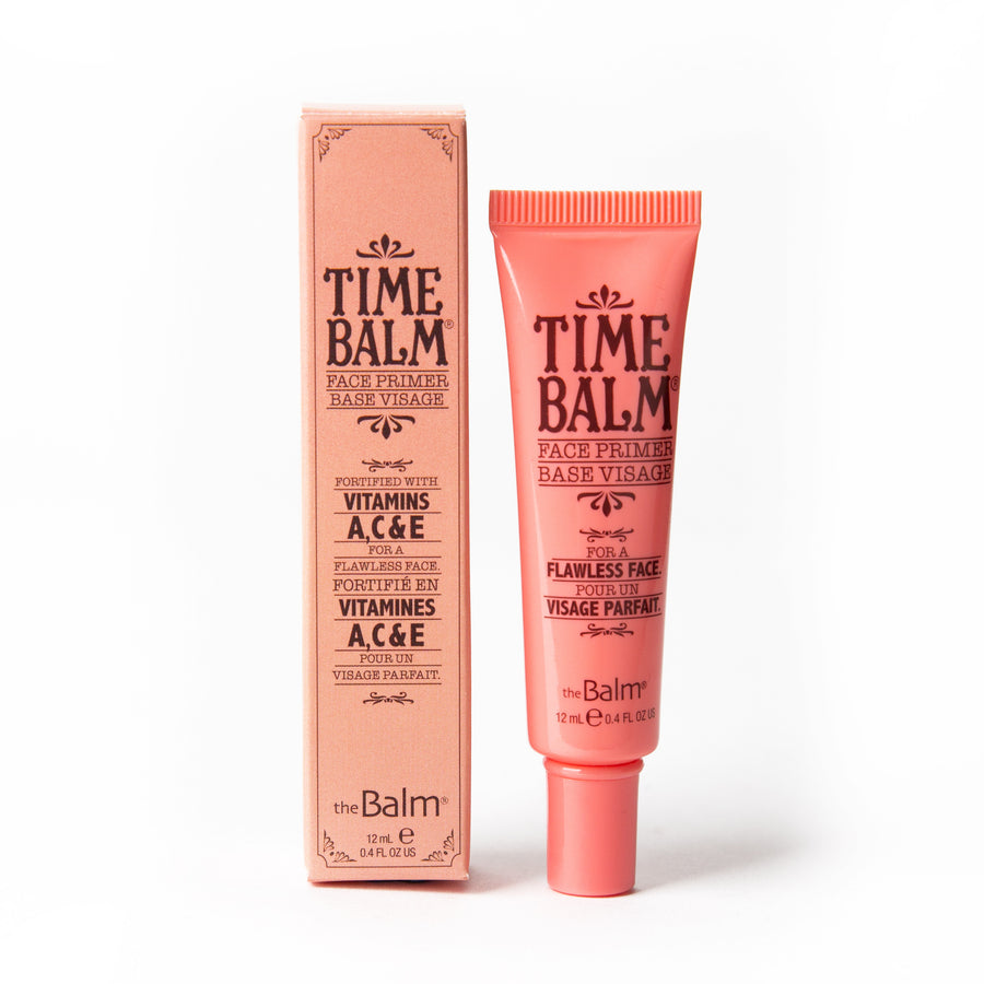 Photograph of Time Balm travel size packaging and makeup