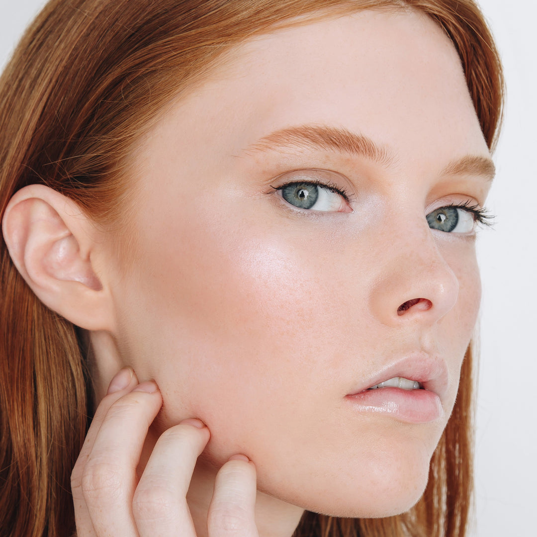 Photograph of Cindy-Lou Manizer highlighter applied to a model