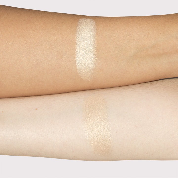 Photograph demonstrating highlighting effect of Mary-lou highlighter. Skin appears brighter