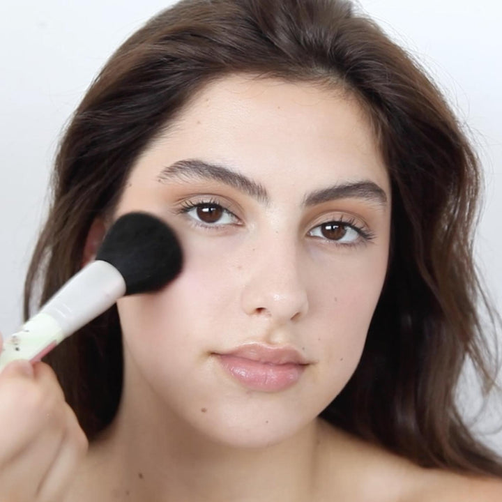 Photograph of Bonnie-Lou Manizer effect on a model's face with brush
